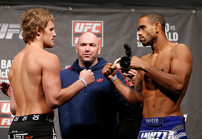LONDON, ENGLAND - FEBRUARY 15:  (L-R) Opponents Gunnar Nelson and Jorge Santiago face off during the UFC weigh-in on February 15, 2013 at Wembley Arena in London, England.  (Photo by Josh Hedges/Zuffa LLC/Zuffa LLC via Getty Images)