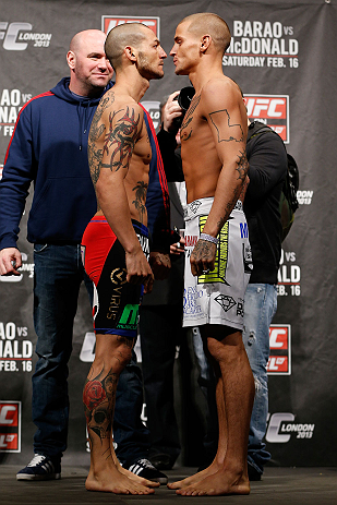LONDON, ENGLAND - FEBRUARY 15:  (L-R) Opponents Cub Swanson and Dustin Poirier face off during the UFC weigh-in on February 15, 2013 at Wembley Arena in London, England.  (Photo by Josh Hedges/Zuffa LLC/Zuffa LLC via Getty Images)