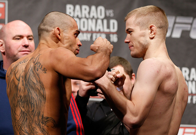 LONDON, ENGLAND - FEBRUARY 15:  (L-R) Opponents Renan Baraoand Michael McDonald face off during the UFC weigh-in on February 15, 2013 at Wembley Arena in London, England.  (Photo by Josh Hedges/Zuffa LLC/Zuffa LLC via Getty Images)