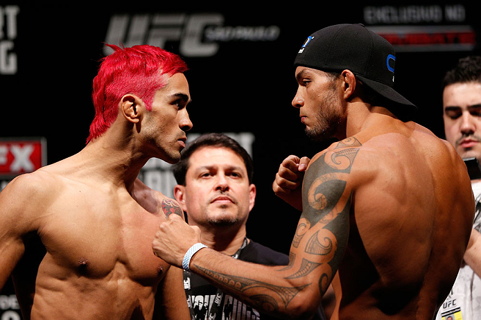 SAO PAULO, BRAZIL - JANUARY 18: (L-R) Opponents Godofredo "Pepey" Castro and Milton Vieira face off during the UFC on FX official weigh-in event on January 18, 2013 at Ibirapuera Gymnasium in Sao Paulo, Brazil. (Photo by Josh Hedges/Zuffa LLC/Zuffa LLC via Getty Images)