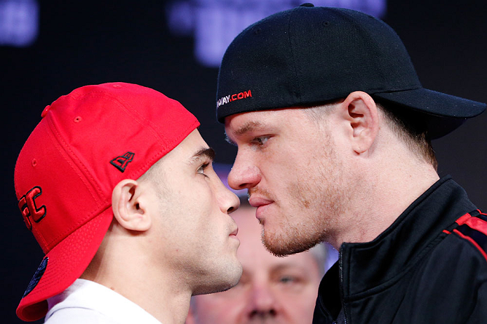 SAO PAULO, BRAZIL - JANUARY 17:  (L-R) Opponents Daniel Sarafian and C.B. Dolloway face off during a UFC press conference on January 17, 2013 at the Hilton Hotel in Sao Paulo, Brazil. (Photo by Josh Hedges/Zuffa LLC/Zuffa LLC via Getty Images)