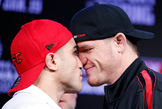 SAO PAULO, BRAZIL - JANUARY 17:  (L-R) Opponents Daniel Sarafian and C.B. Dolloway face off during a UFC press conference on January 17, 2013 at the Hilton Hotel in Sao Paulo, Brazil. (Photo by Josh Hedges/Zuffa LLC/Zuffa LLC via Getty Images)