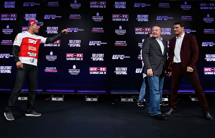 SAO PAULO, BRAZIL - JANUARY 17:  Opponents Vitor Belfort (L) and Michael Bisping (R) are separated after a heated face off during a UFC press conference on January 17, 2013 at the Hilton Hotel in Sao Paulo, Brazil. (Photo by Josh Hedges/Zuffa LLC/Zuffa LLC via Getty Images)