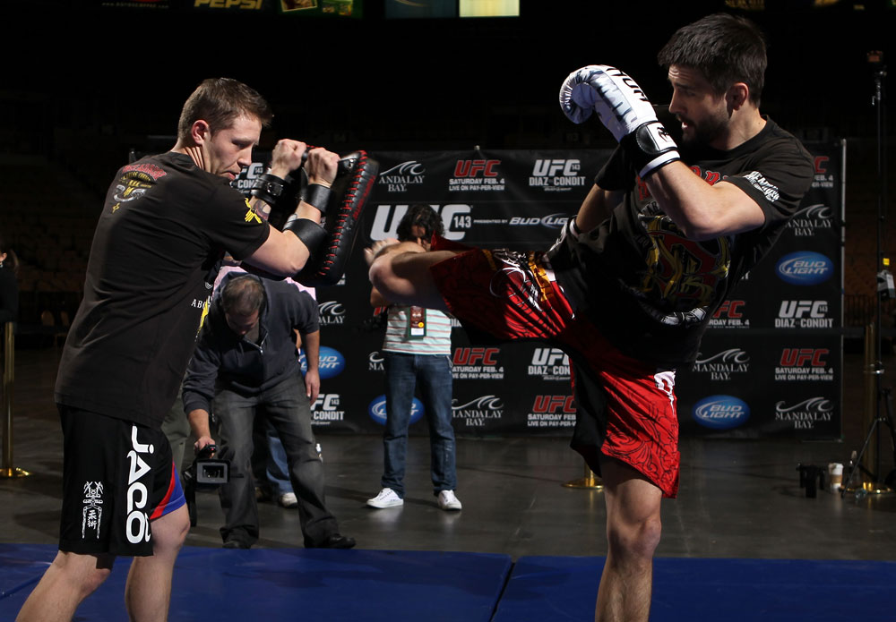 LAS VEGAS, NV - FEBRUARY 01: Carlos Condit works out for the media and fans during the UFC 143 open workouts at Mandalay Bay Events Center on February 1, 2012 in Las Vegas, United States. (Photo by Josh Hedges/Zuffa LLC/Zuffa LLC via Getty Images) *** Local Caption *** Carlos Condit