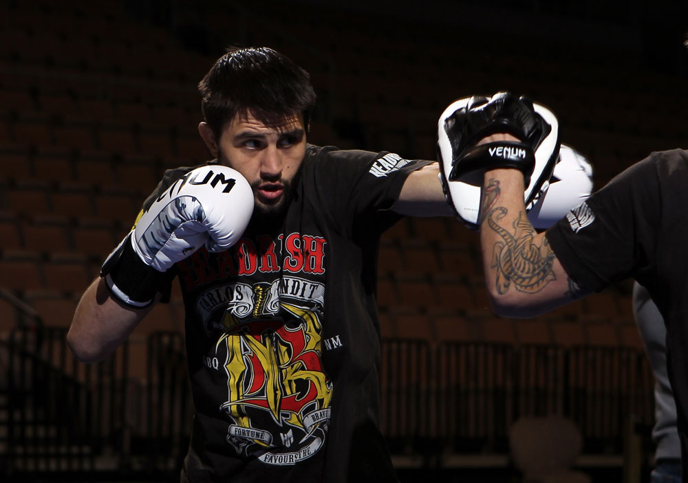 LAS VEGAS, NV - FEBRUARY 01: Carlos Condit works out for the media and fans during the UFC 143 open workouts at Mandalay Bay Events Center on February 1, 2012 in Las Vegas, United States. (Photo by Josh Hedges/Zuffa LLC/Zuffa LLC via Getty Images) *** Local Caption *** Carlos Condit