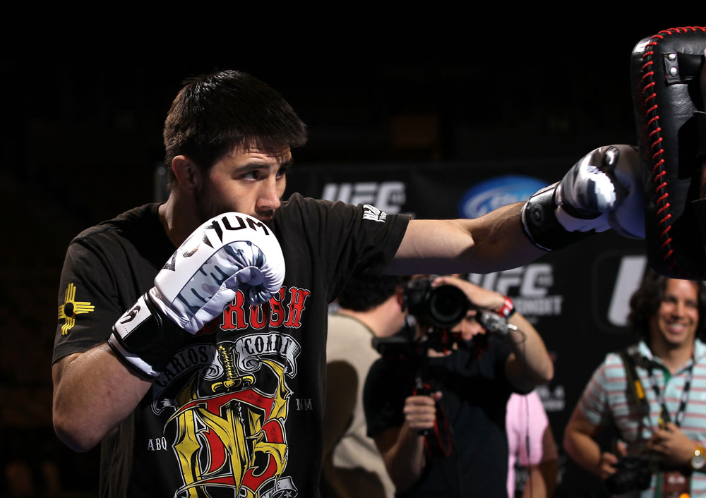 LAS VEGAS, NV - FEBRUARY 01: Carlos Condit works out for the media and fans during the UFC 143 open workouts at Mandalay Bay Events Center on February 1, 2012 in Las Vegas, United States. (Photo by Josh Hedges/Zuffa LLC/Zuffa LLC via Getty Images) *** Local Caption *** Carlos Condit
