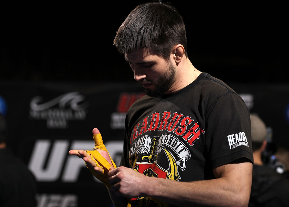 LAS VEGAS, NV - FEBRUARY 01: Carlos Condit wraps his hands before working out for the media and fans during the UFC 143 open workouts at Mandalay Bay Events Center on February 1, 2012 in Las Vegas, United States. (Photo by Josh Hedges/Zuffa LLC/Zuffa LLC via Getty Images) *** Local Caption *** Carlos Condit