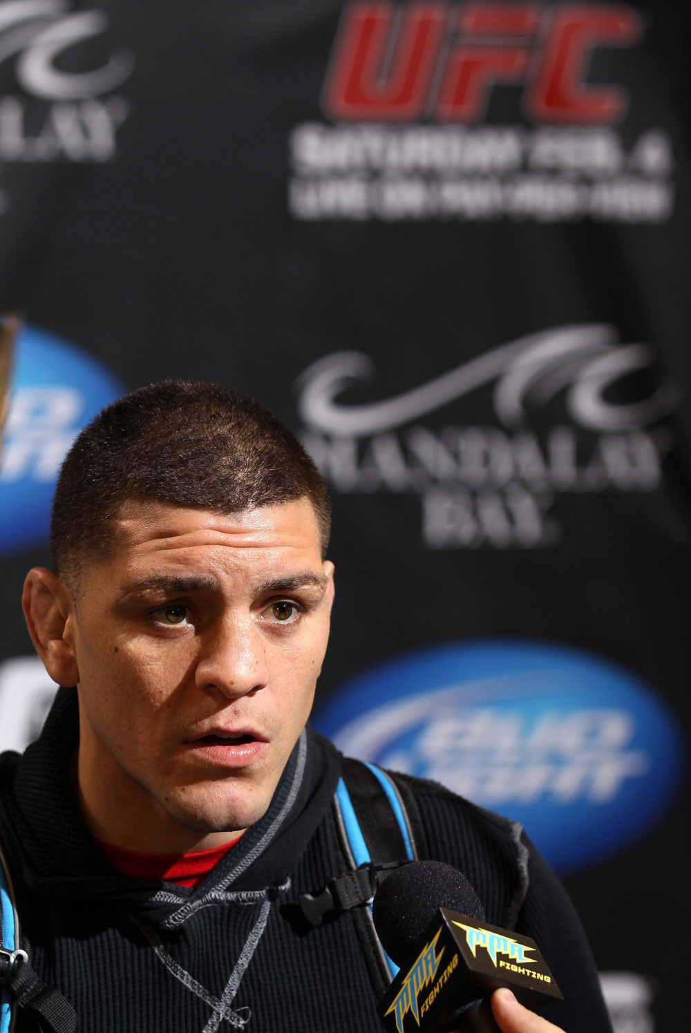 LAS VEGAS, NV - FEBRUARY 01: Nick Diaz answers questions from the media during the UFC 143 open workouts at Mandalay Bay Events Center on February 1, 2012 in Las Vegas, United States. (Photo by Josh Hedges/Zuffa LLC/Zuffa LLC via Getty Images) *** Local Caption *** Nick Diaz