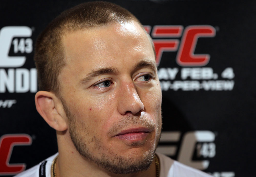 LAS VEGAS, NV - FEBRUARY 01: Georges St-Pierre answers questions from the media before the UFC 143 open workouts at Mandalay Bay Events Center on February 1, 2012 in Las Vegas, United States. (Photo by Josh Hedges/Zuffa LLC/Zuffa LLC via Getty Images) *** Local Caption *** Georges St-Pierre