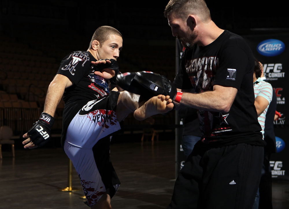 LAS VEGAS, NV - FEBRUARY 01: Mike Pierce works out for the media and fans during the UFC 143 open workouts at Mandalay Bay Events Center on February 1, 2012 in Las Vegas, United States. (Photo by Josh Hedges/Zuffa LLC/Zuffa LLC via Getty Images) *** Local Caption *** Mike Pierce