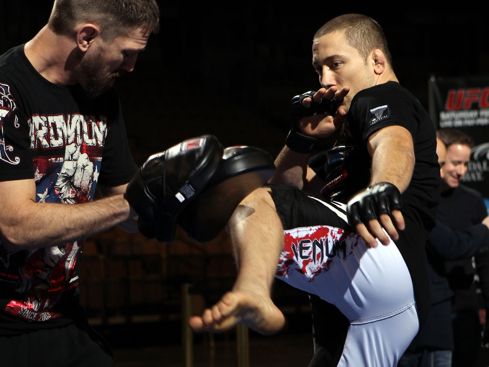 LAS VEGAS, NV - FEBRUARY 01: Mike Pierce works out for the media and fans during the UFC 143 open workouts at Mandalay Bay Events Center on February 1, 2012 in Las Vegas, United States. (Photo by Josh Hedges/Zuffa LLC/Zuffa LLC via Getty Images) *** Local Caption *** Mike Pierce