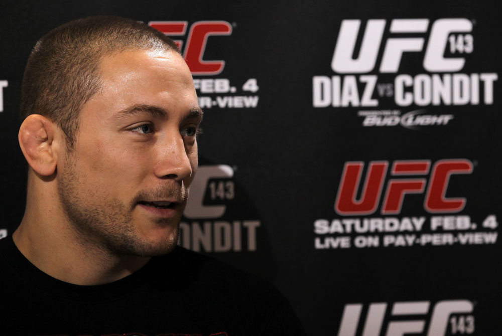 LAS VEGAS, NV - FEBRUARY 01: Mike Pierce answers questions from the media during the UFC 143 open workouts at Mandalay Bay Events Center on February 1, 2012 in Las Vegas, United States. (Photo by Josh Hedges/Zuffa LLC/Zuffa LLC via Getty Images) *** Local Caption *** Mike Pierce