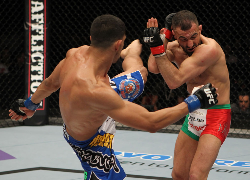 STOCKHOLM, SWEDEN - APRIL 14: (L-R) Yoislandy Izquierdo kicks Reza Madadi during their lightweight bout at the UFC on Fuel TV event at Ericsson Globe on April 14, 2012 in Stockholm, Sweden. (Photo by Josh Hedges/Zuffa LLC/Zuffa LLC via Getty Images)