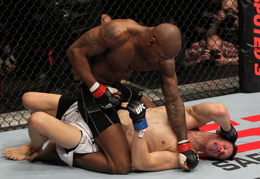 STOCKHOLM, SWEDEN - APRIL 14: (L-R) Francis Carmont punches Magnus Cedenblad during their middleweight bout at the UFC on Fuel TV event at Ericsson Globe on April 14, 2012 in Stockholm, Sweden. (Photo by Josh Hedges/Zuffa LLC/Zuffa LLC via Getty Images)