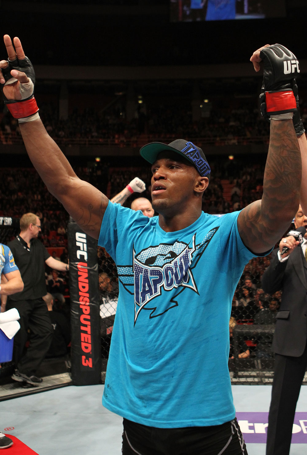 STOCKHOLM, SWEDEN - APRIL 14: (L-R) Francis Carmont is declared the winner in his fight over Magnus Cedenblad at the UFC on Fuel TV event at Ericsson Globe on April 14, 2012 in Stockholm, Sweden. (Photo by Josh Hedges/Zuffa LLC/Zuffa LLC via Getty Images)