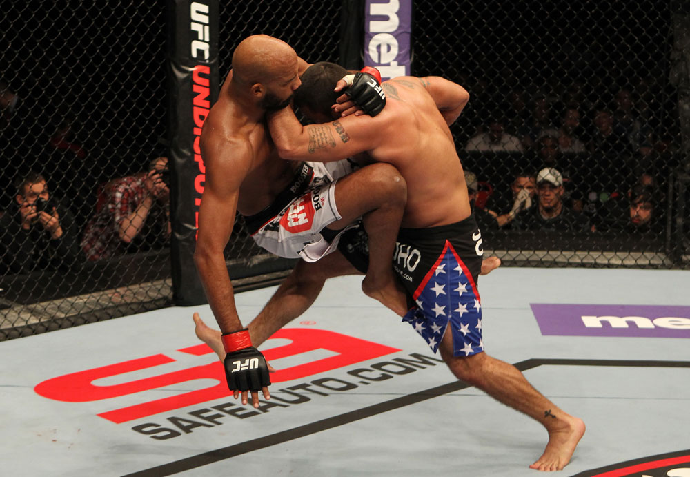 STOCKHOLM, SWEDEN - APRIL 14: (R-L) Tom DeBlass takes down Cyrille Diabate during their light heavyweight bout at the UFC on Fuel TV event at Ericsson Globe on April 14, 2012 in Stockholm, Sweden. (Photo by Josh Hedges/Zuffa LLC/Zuffa LLC via Getty Images)