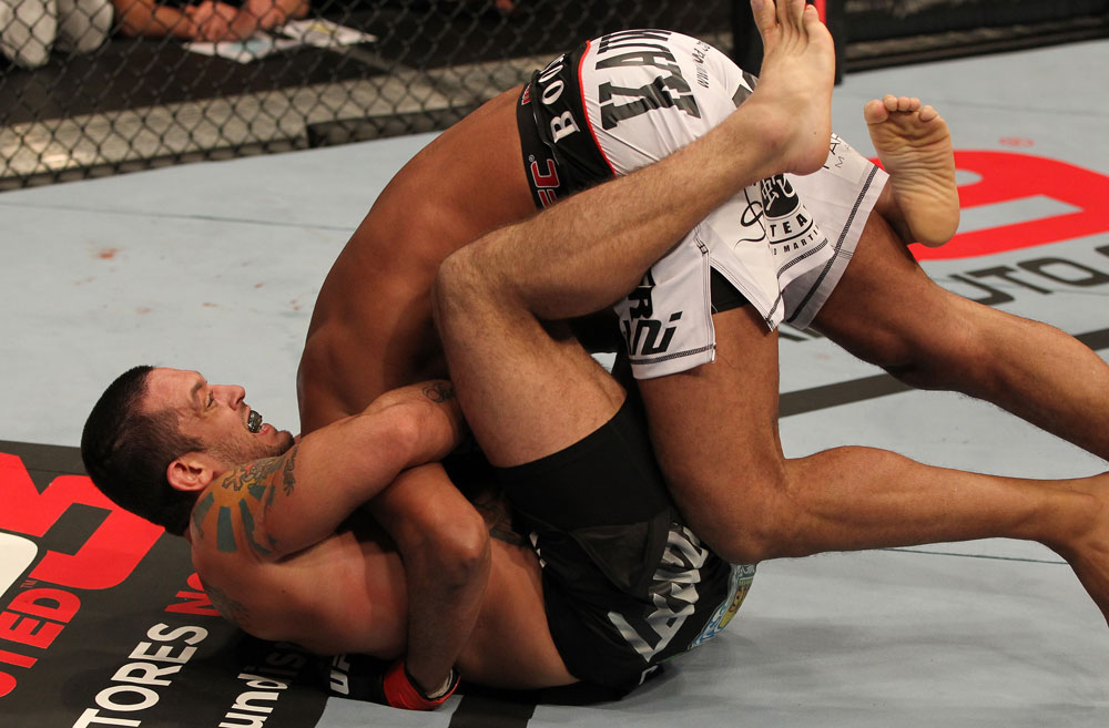 STOCKHOLM, SWEDEN - APRIL 14: (L-R) Tom DeBlass attempts a guillotine choke submission against Cyrille Diabate during their light heavyweight bout at the UFC on Fuel TV event at Ericsson Globe on April 14, 2012 in Stockholm, Sweden. (Photo by Josh Hedges/Zuffa LLC/Zuffa LLC via Getty Images)