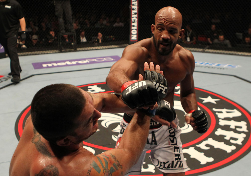 STOCKHOLM, SWEDEN - APRIL 14: (R-L) Cyrille Diabate punches Tom DeBlass during their light heavyweight bout at the UFC on Fuel TV event at Ericsson Globe on April 14, 2012 in Stockholm, Sweden. (Photo by Josh Hedges/Zuffa LLC/Zuffa LLC via Getty Images)