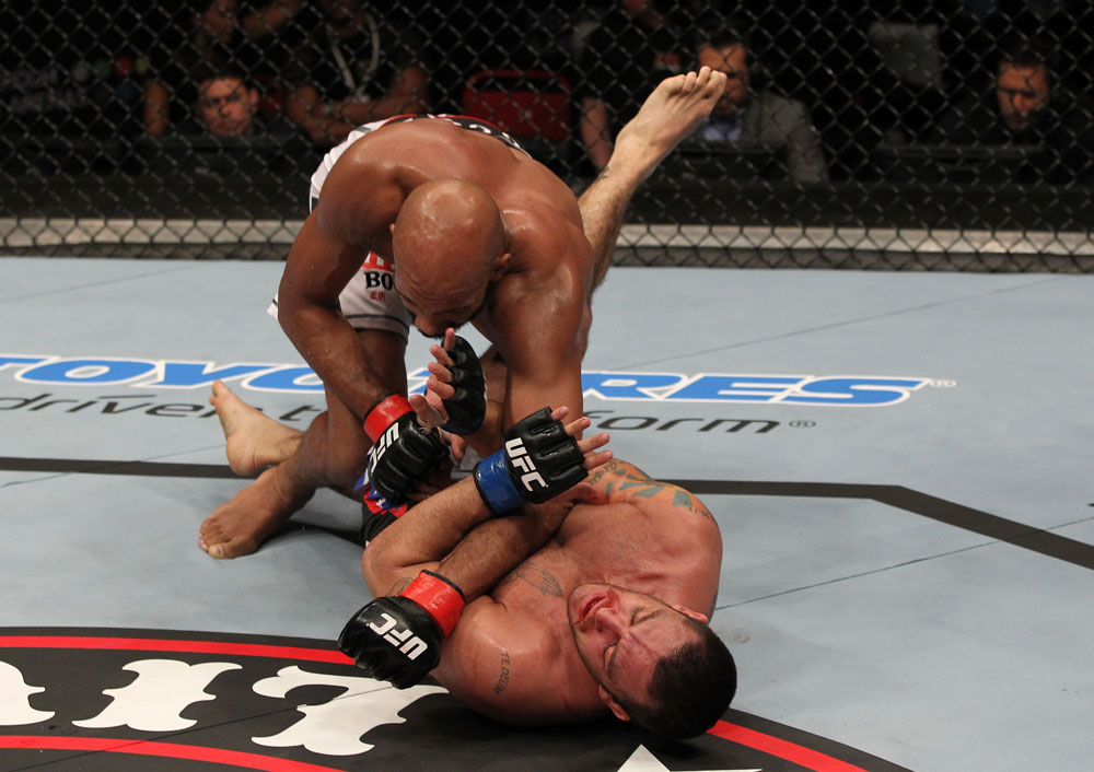 STOCKHOLM, SWEDEN - APRIL 14: (L-R) Cyrille Diabate punches Tom DeBlass during their light heavyweight bout at the UFC on Fuel TV event at Ericsson Globe on April 14, 2012 in Stockholm, Sweden. (Photo by Josh Hedges/Zuffa LLC/Zuffa LLC via Getty Images)