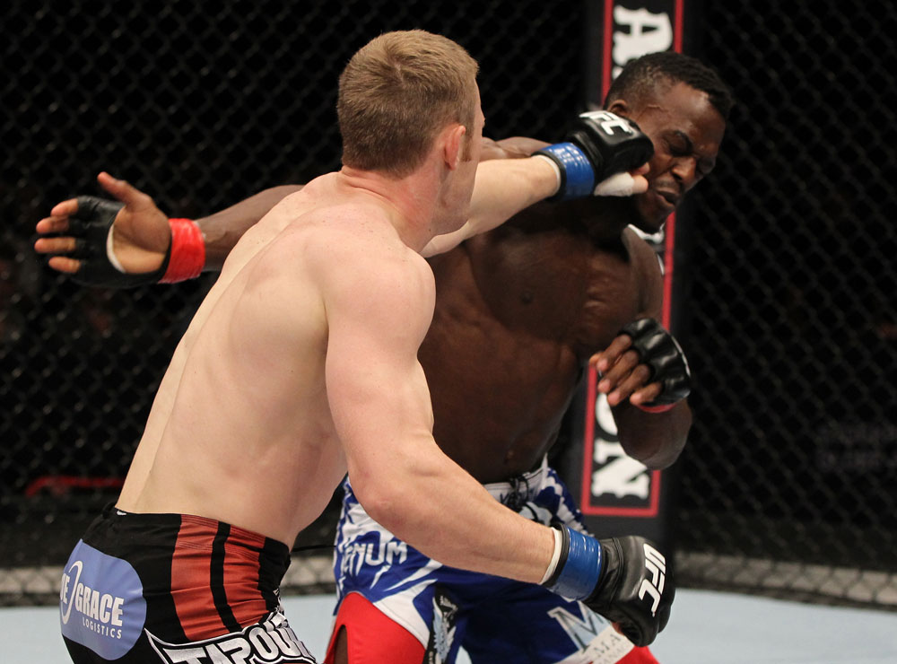 STOCKHOLM, SWEDEN - APRIL 14: (L-R) James Head punches Papy Abedi during their welterweight bout at the UFC on Fuel TV event at Ericsson Globe on April 14, 2012 in Stockholm, Sweden. (Photo by Josh Hedges/Zuffa LLC/Zuffa LLC via Getty Images)