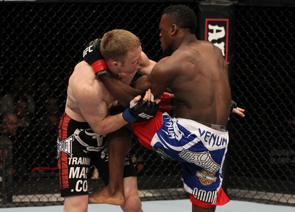 STOCKHOLM, SWEDEN - APRIL 14: (R-L) Papy Abedi delivers a knee strike against James Head during their welterweight bout at the UFC on Fuel TV event at Ericsson Globe on April 14, 2012 in Stockholm, Sweden. (Photo by Josh Hedges/Zuffa LLC/Zuffa LLC via Getty Images)