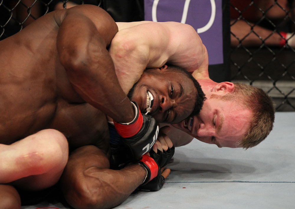 STOCKHOLM, SWEDEN - APRIL 14: (R-L) James Head secures a rear choke submission to defeating Papy Abedi in a welterweight bout at the UFC on Fuel TV event at Ericsson Globe on April 14, 2012 in Stockholm, Sweden. (Photo by Josh Hedges/Zuffa LLC/Zuffa LLC via Getty Images)