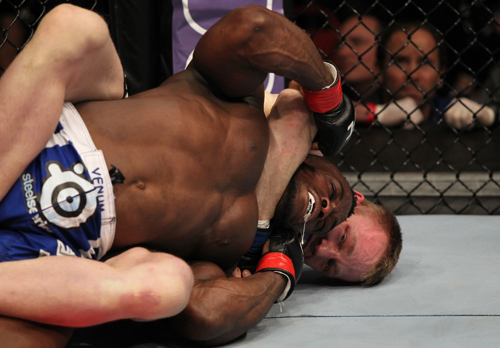 STOCKHOLM, SWEDEN - APRIL 14: (R-L) James Head secures a rear choke submission to defeating Papy Abedi in a welterweight bout at the UFC on Fuel TV event at Ericsson Globe on April 14, 2012 in Stockholm, Sweden. (Photo by Josh Hedges/Zuffa LLC/Zuffa LLC via Getty Images)