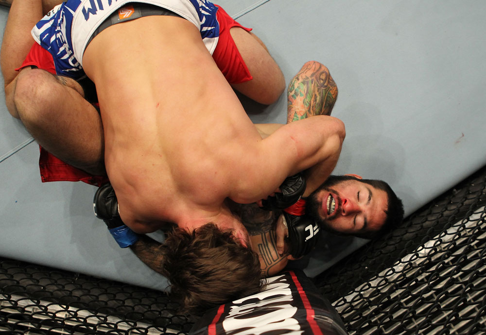 STOCKHOLM, SWEDEN - APRIL 14: (L-R) Brad Pickett punches Damacio Page during their bantamweight bout at the UFC on Fuel TV event at Ericsson Globe on April 14, 2012 in Stockholm, Sweden. (Photo by Josh Hedges/Zuffa LLC/Zuffa LLC via Getty Images)