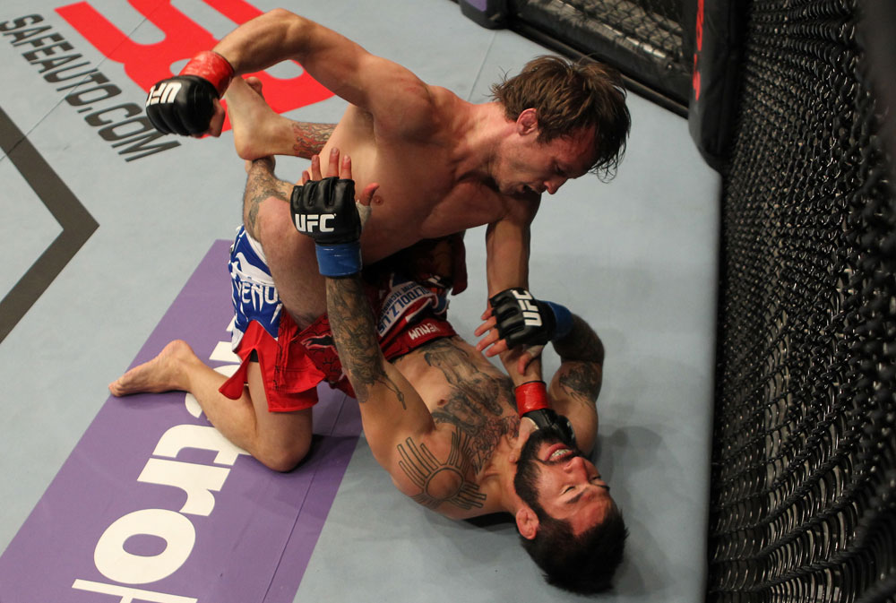 STOCKHOLM, SWEDEN - APRIL 14: (L-R) Brad Pickett punches Damacio Page during their bantamweight bout at the UFC on Fuel TV event at Ericsson Globe on April 14, 2012 in Stockholm, Sweden. (Photo by Josh Hedges/Zuffa LLC/Zuffa LLC via Getty Images)