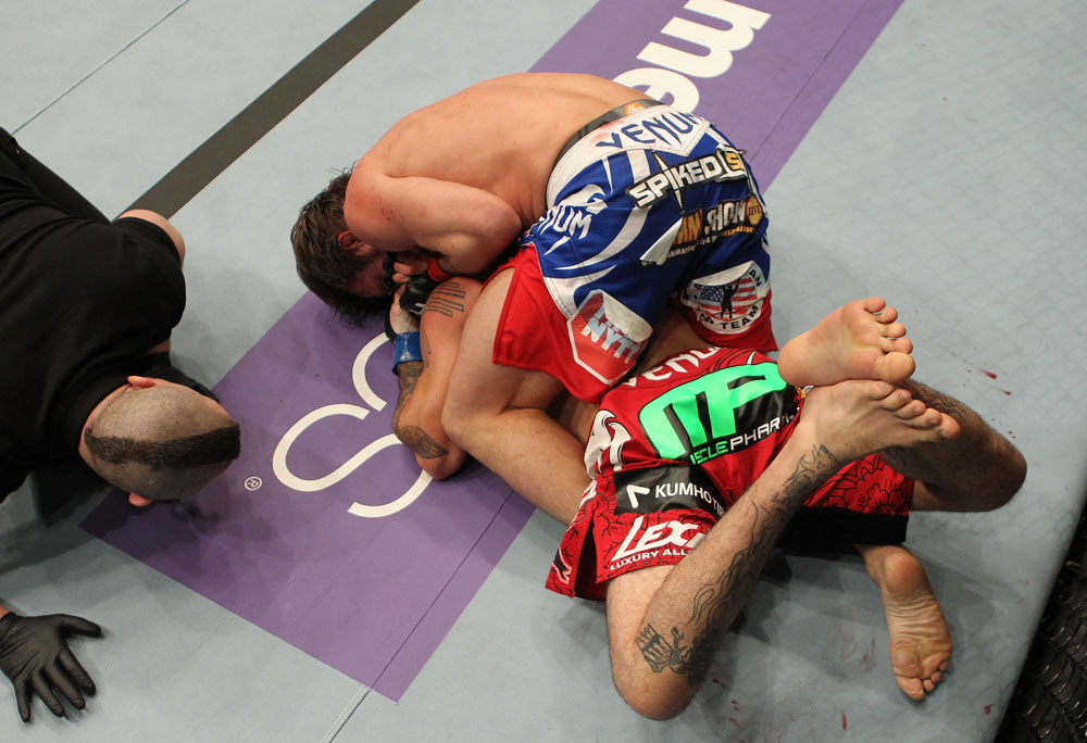 STOCKHOLM, SWEDEN - APRIL 14: (L-R) Brad Pickett defeats Damacio Page with a rear choke submission in a bantamweight bout at the UFC on Fuel TV event at Ericsson Globe on April 14, 2012 in Stockholm, Sweden. (Photo by Josh Hedges/Zuffa LLC/Zuffa LLC via Getty Images)
