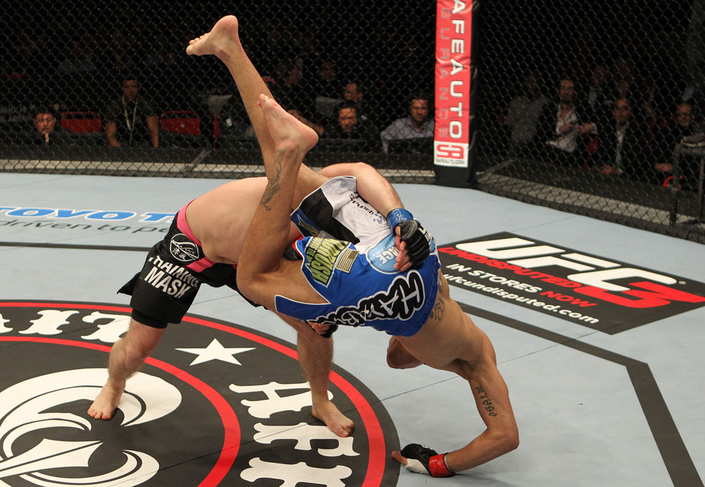 STOCKHOLM, SWEDEN - APRIL 14: John Maguire throws DaMarques Johnson during their welterweight bout at the UFC on Fuel TV event at Ericsson Globe on April 14, 2012 in Stockholm, Sweden. (Photo by Josh Hedges/Zuffa LLC/Zuffa LLC via Getty Images)
