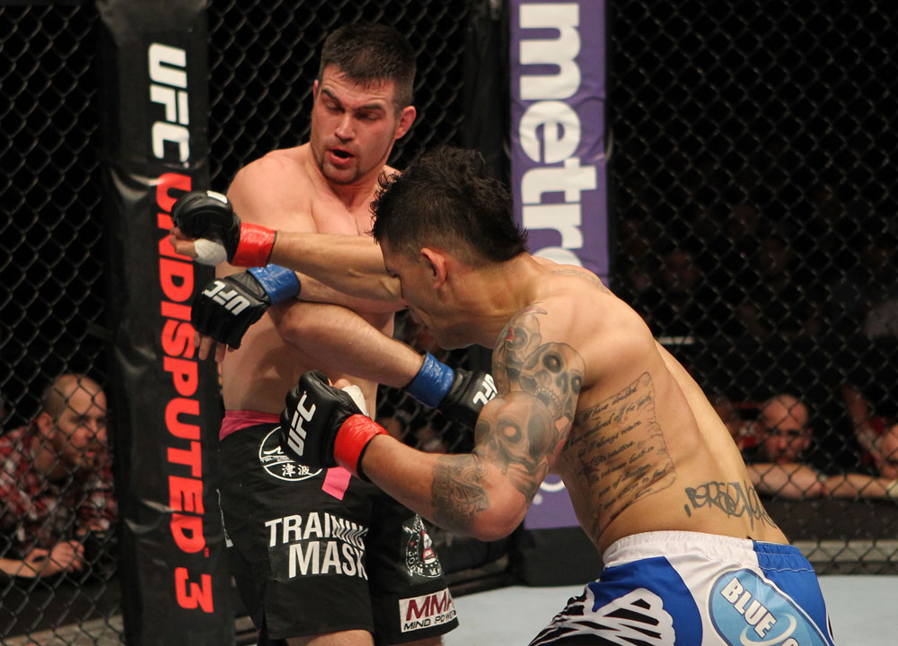 STOCKHOLM, SWEDEN - APRIL 14: (R-L) DaMarques Johnson punches John Maguire during their welterweight bout at the UFC on Fuel TV event at Ericsson Globe on April 14, 2012 in Stockholm, Sweden. (Photo by Josh Hedges/Zuffa LLC/Zuffa LLC via Getty Images)