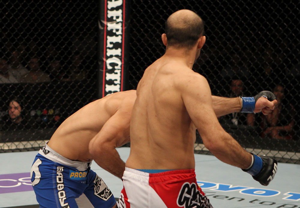 STOCKHOLM, SWEDEN - APRIL 14: (R-L) Siyar Bahadurzada knocks out Paulo Thiago with a punch during their welterweight bout at the UFC on Fuel TV event at Ericsson Globe on April 14, 2012 in Stockholm, Sweden. (Photo by Josh Hedges/Zuffa LLC/Zuffa LLC via Getty Images)