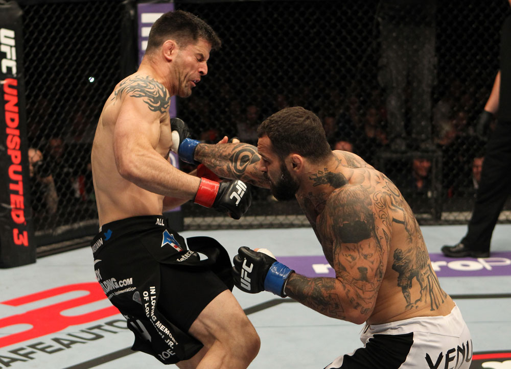 STOCKHOLM, SWEDEN - APRIL 14: (R-L) Alessio Sakara punches Brian Stann during their middleweight bout at the UFC on Fuel TV event at Ericsson Globe on April 14, 2012 in Stockholm, Sweden. (Photo by Josh Hedges/Zuffa LLC/Zuffa LLC via Getty Images)