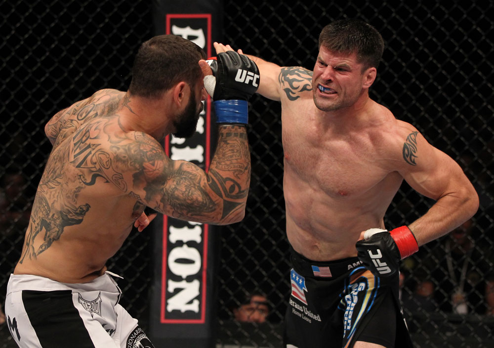 STOCKHOLM, SWEDEN - APRIL 14: (R-L) Brian Stann punches Alessio Sakara during their middleweight bout at the UFC on Fuel TV event at Ericsson Globe on April 14, 2012 in Stockholm, Sweden. (Photo by Josh Hedges/Zuffa LLC/Zuffa LLC via Getty Images)