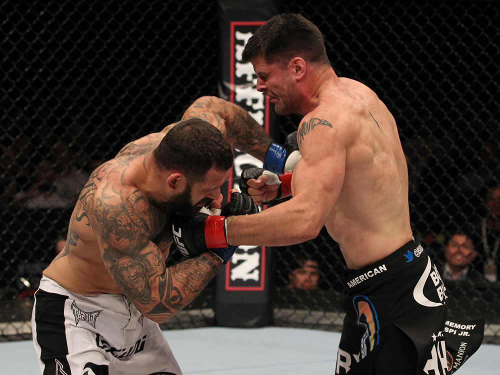 STOCKHOLM, SWEDEN - APRIL 14: (R-L) Brian Stann and Alessio Sakara trade punches during their middleweight bout at the UFC on Fuel TV event at Ericsson Globe on April 14, 2012 in Stockholm, Sweden. (Photo by Josh Hedges/Zuffa LLC/Zuffa LLC via Getty Images)