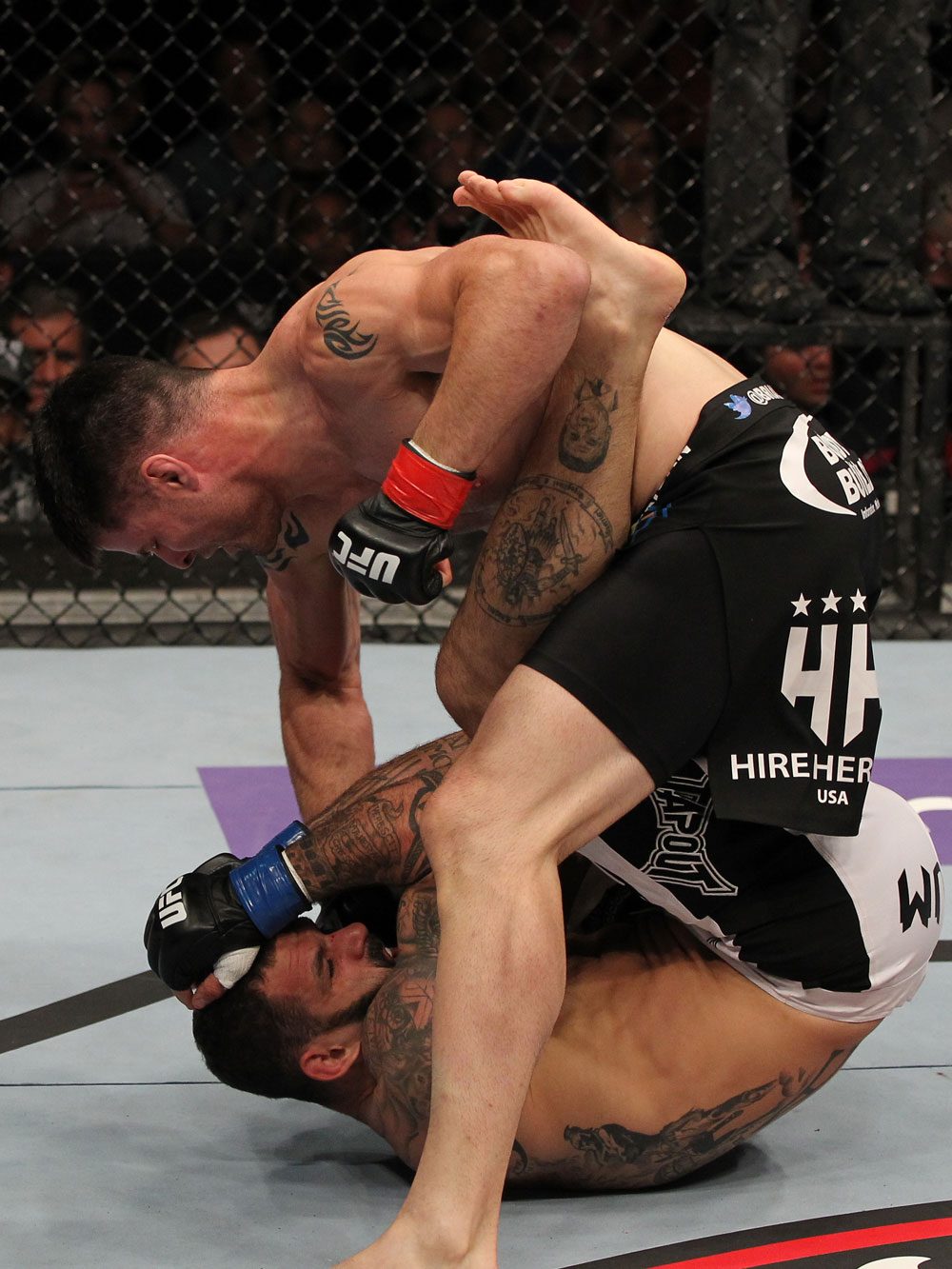 STOCKHOLM, SWEDEN - APRIL 14: (R-L) Brian Stann punches Alessio Sakara during their middleweight bout at the UFC on Fuel TV event at Ericsson Globe on April 14, 2012 in Stockholm, Sweden. (Photo by Josh Hedges/Zuffa LLC/Zuffa LLC via Getty Images)