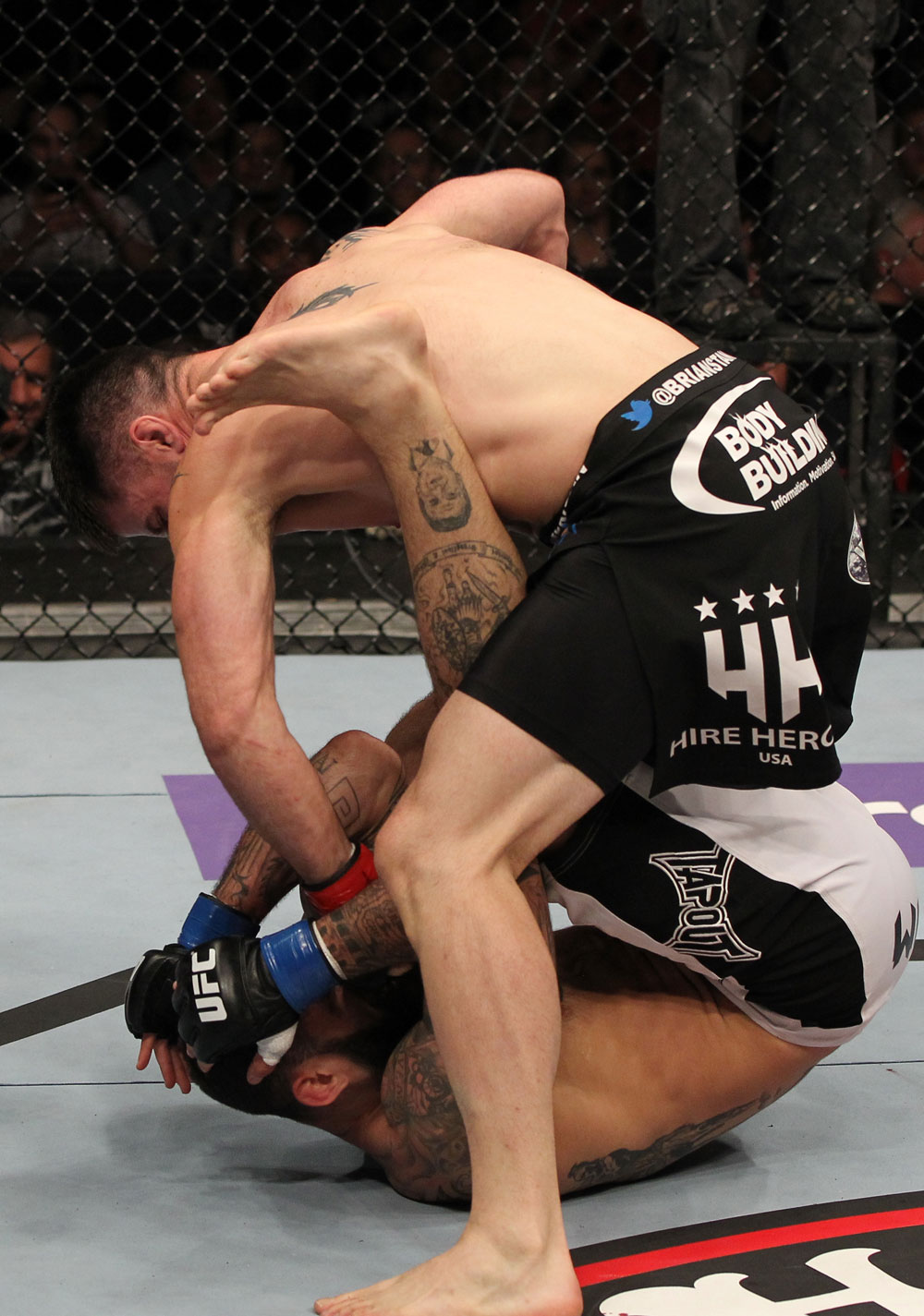 STOCKHOLM, SWEDEN - APRIL 14: (R-L) Brian Stann punches Alessio Sakara during their middleweight bout at the UFC on Fuel TV event at Ericsson Globe on April 14, 2012 in Stockholm, Sweden. (Photo by Josh Hedges/Zuffa LLC/Zuffa LLC via Getty Images)