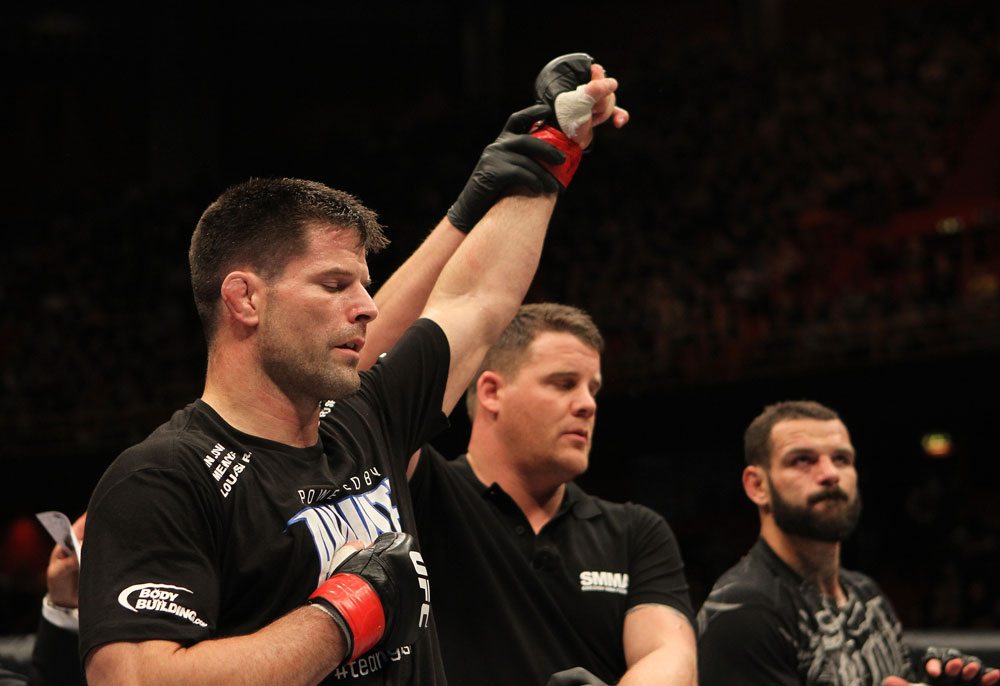 STOCKHOLM, SWEDEN - APRIL 14: Brian Stann (L) reacts after defeating Alessio Sakara (R) by TKO in a middleweight bout at the UFC on Fuel TV event at Ericsson Globe on April 14, 2012 in Stockholm, Sweden. (Photo by Josh Hedges/Zuffa LLC/Zuffa LLC via Getty Images)