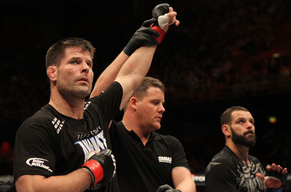 STOCKHOLM, SWEDEN - APRIL 14: Brian Stann (L) reacts after defeating Alessio Sakara (R) by TKO in a middleweight bout at the UFC on Fuel TV event at Ericsson Globe on April 14, 2012 in Stockholm, Sweden. (Photo by Josh Hedges/Zuffa LLC/Zuffa LLC via Getty Images)