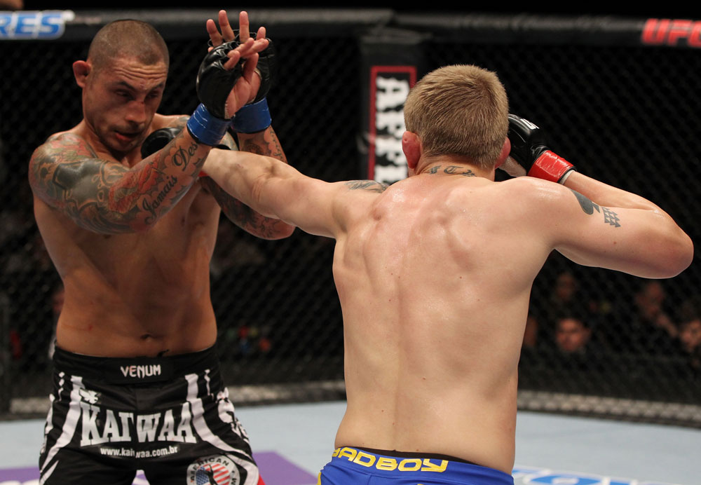 STOCKHOLM, SWEDEN - APRIL 14: (R-L) Alexander Gustafsson punches Thiago Silva during their light heavyweight bout at the UFC on Fuel TV event at Ericsson Globe on April 14, 2012 in Stockholm, Sweden. (Photo by Josh Hedges/Zuffa LLC/Zuffa LLC via Getty Images)