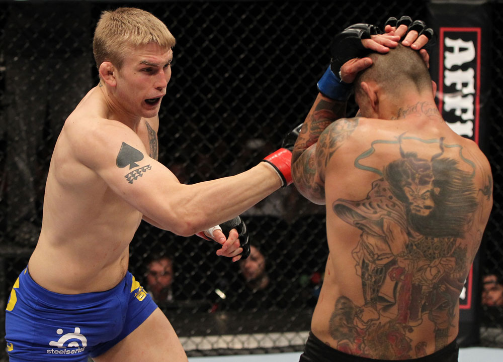 STOCKHOLM, SWEDEN - APRIL 14: (L-R) Alexander Gustafsson punches Thiago Silva during their light heavyweight bout at the UFC on Fuel TV event at Ericsson Globe on April 14, 2012 in Stockholm, Sweden. (Photo by Josh Hedges/Zuffa LLC/Zuffa LLC via Getty Images)
