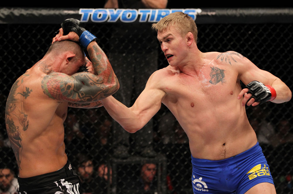 STOCKHOLM, SWEDEN - APRIL 14:  (R-L) Alexander Gustafsson punches Thiago Silva during their light heavyweight bout at the UFC on Fuel TV event at Ericsson Globe on April 14, 2012 in Stockholm, Sweden.  (Photo by Josh Hedges/Zuffa LLC/Zuffa LLC via Getty Images)