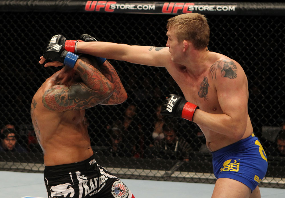 STOCKHOLM, SWEDEN - APRIL 14: (R-L) Alexander Gustafsson punches Thiago Silva during their light heavyweight bout at the UFC on Fuel TV event at Ericsson Globe on April 14, 2012 in Stockholm, Sweden. (Photo by Josh Hedges/Zuffa LLC/Zuffa LLC via Getty Images)
