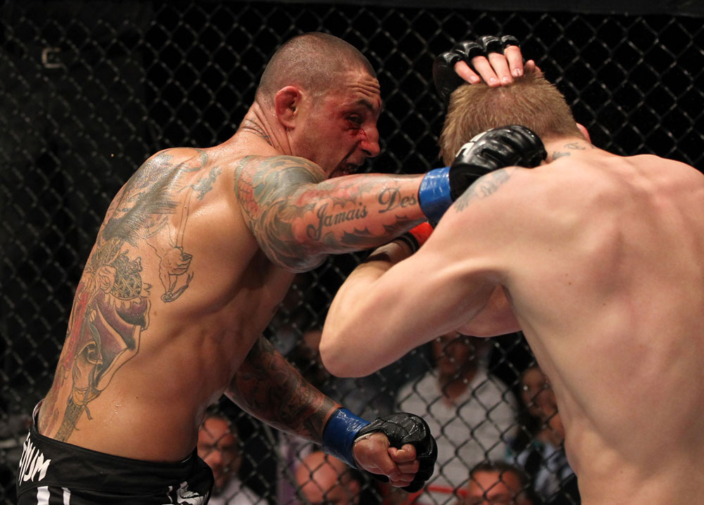 STOCKHOLM, SWEDEN - APRIL 14: (L-R) Thiago Silva punches Alexander Gustafsson during their light heavyweight bout at the UFC on Fuel TV event at Ericsson Globe on April 14, 2012 in Stockholm, Sweden. (Photo by Josh Hedges/Zuffa LLC/Zuffa LLC via Getty Images)