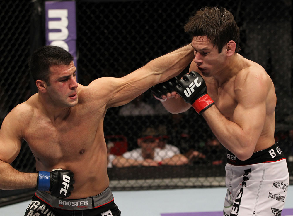 STOCKHOLM, SWEDEN - APRIL 14: (L-R) Besam Yousef punches Simeon Thoresen during their welterweight bout at the UFC on Fuel TV event at Ericsson Globe on April 14, 2012 in Stockholm, Sweden. (Photo by Josh Hedges/Zuffa LLC/Zuffa LLC via Getty Images)