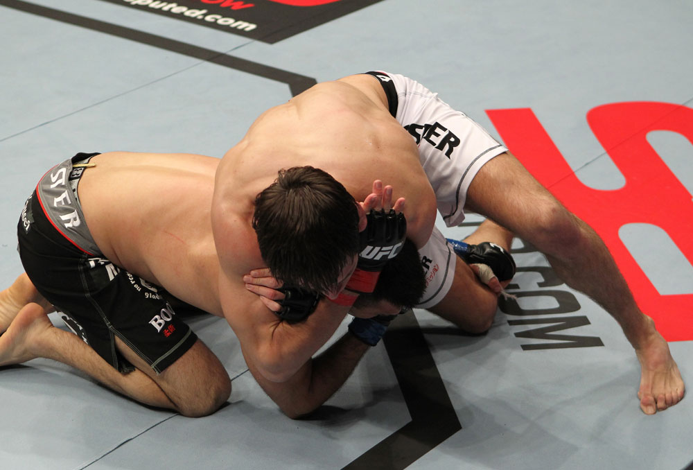 STOCKHOLM, SWEDEN - APRIL 14: (R-L) Simeon Thoresen attempts to secure a rear choke submission against Besam Yousef during their welterweight bout at the UFC on Fuel TV event at Ericsson Globe on April 14, 2012 in Stockholm, Sweden. (Photo by Josh Hedges/Zuffa LLC/Zuffa LLC via Getty Images)