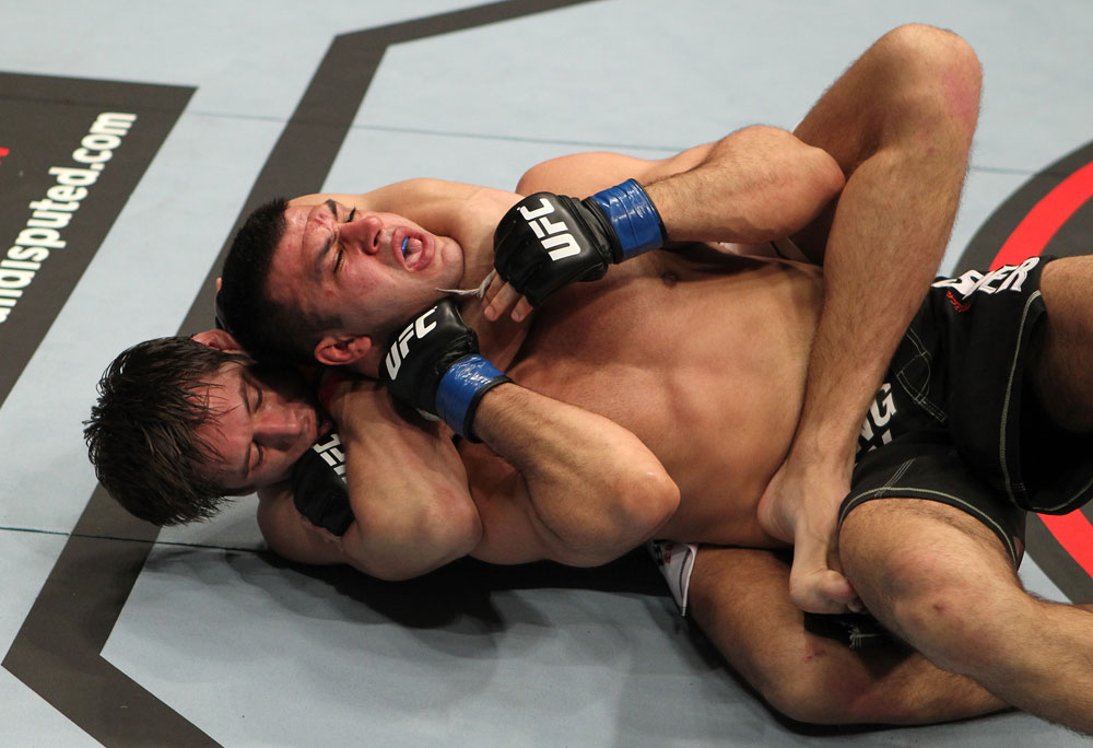 STOCKHOLM, SWEDEN - APRIL 14: (L-R) Simeon Thoresen secures a rear choke submission against Besam Yousef during their welterweight bout at the UFC on Fuel TV event at Ericsson Globe on April 14, 2012 in Stockholm, Sweden. (Photo by Josh Hedges/Zuffa LLC/Zuffa LLC via Getty Images)