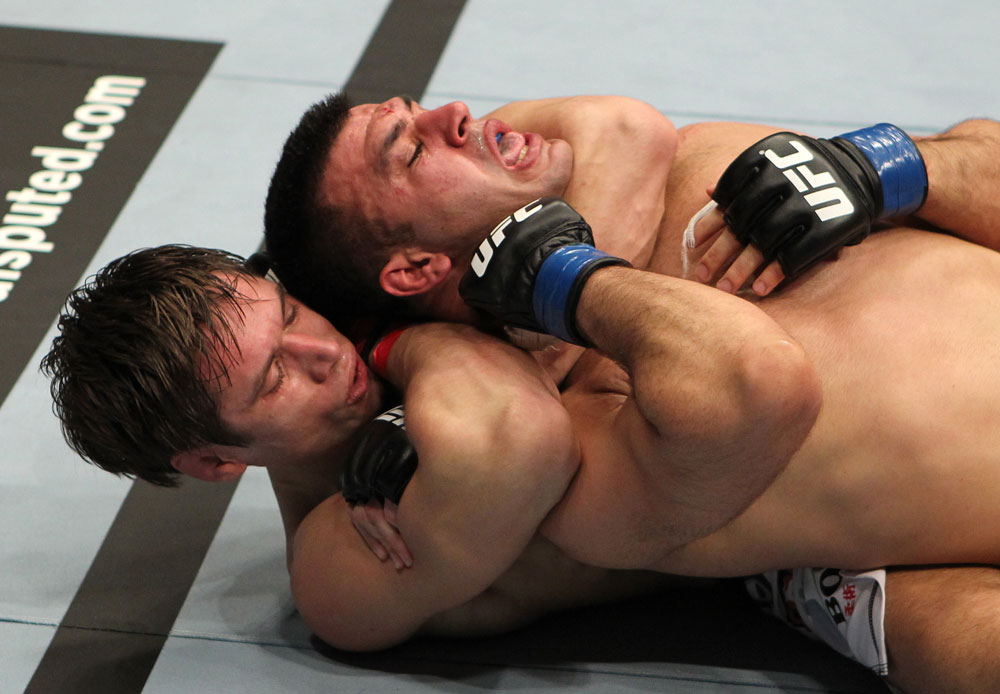 STOCKHOLM, SWEDEN - APRIL 14: (L-R) Simeon Thoresen secures a rear choke submission against Besam Yousef during their welterweight bout at the UFC on Fuel TV event at Ericsson Globe on April 14, 2012 in Stockholm, Sweden. (Photo by Josh Hedges/Zuffa LLC/Zuffa LLC via Getty Images)