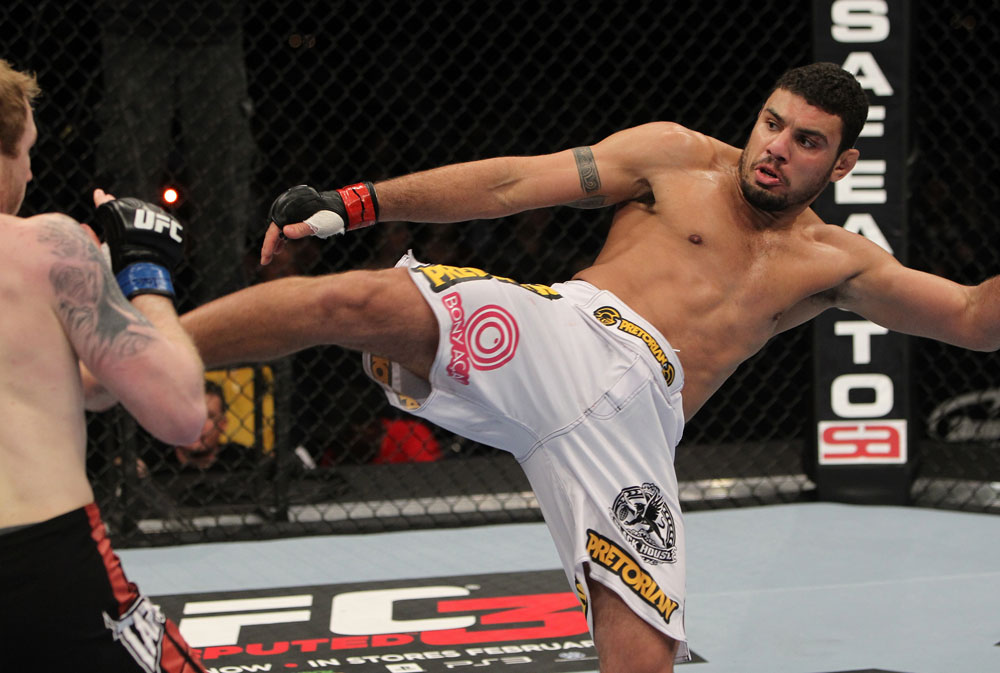 NASHVILLE, TN - JANUARY 20:  (R-L) Fabricio Camoes kicks Tommy Hayden during the UFC on FX event at Bridgestone Arena on January 20, 2012 in Nashville, Tennessee.  (Photo by Josh Hedges/Zuffa LLC/Zuffa LLC via Getty Images)